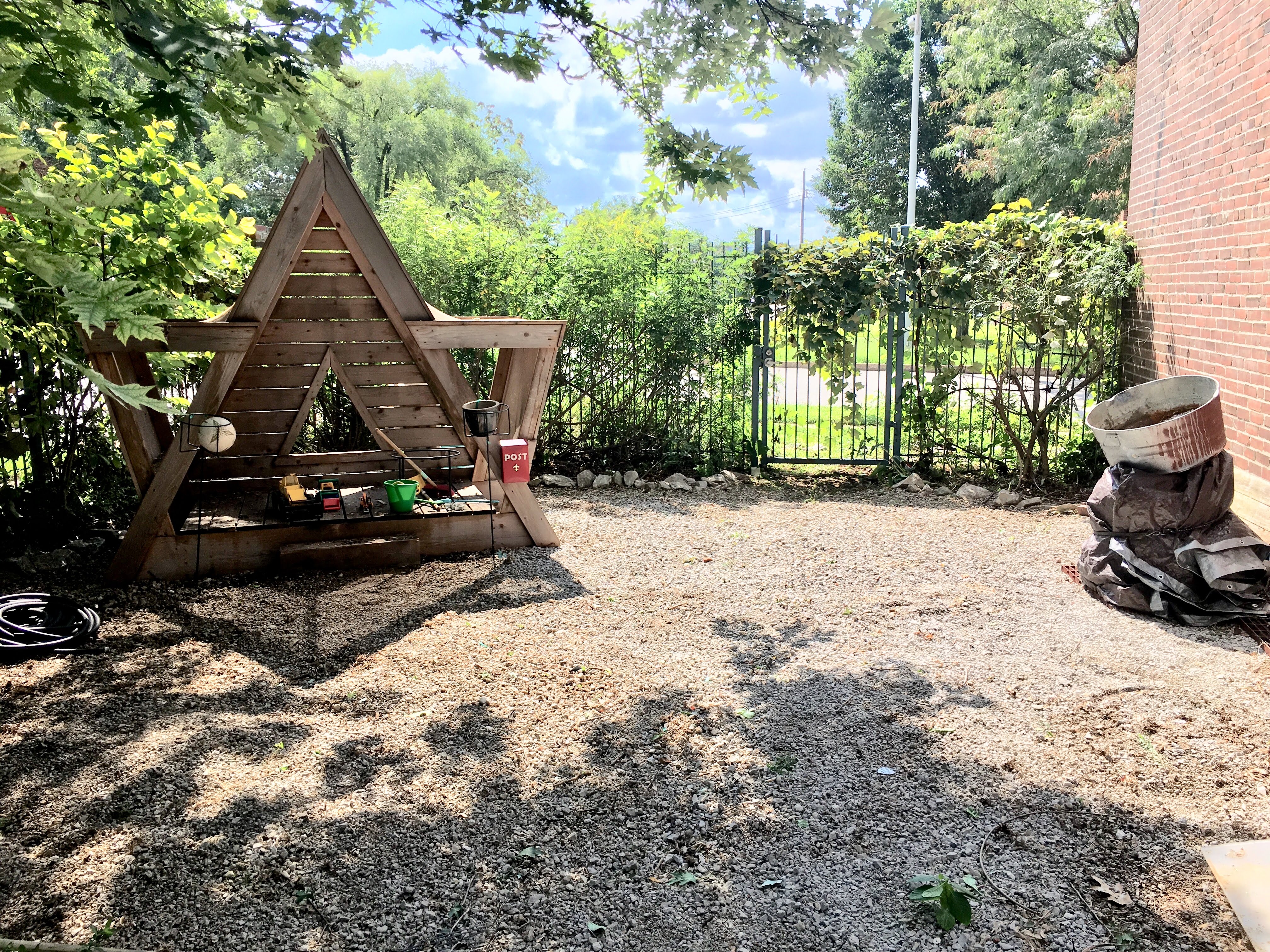 Shot of my front yard with an A frame sandbox.